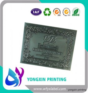 Custom embossed metal label for wine bottle